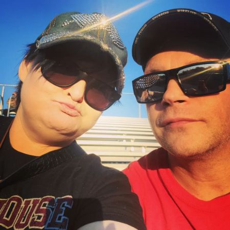 Stormy Deal and her boyfriend, Seth Brevis, took a picture at a football game.